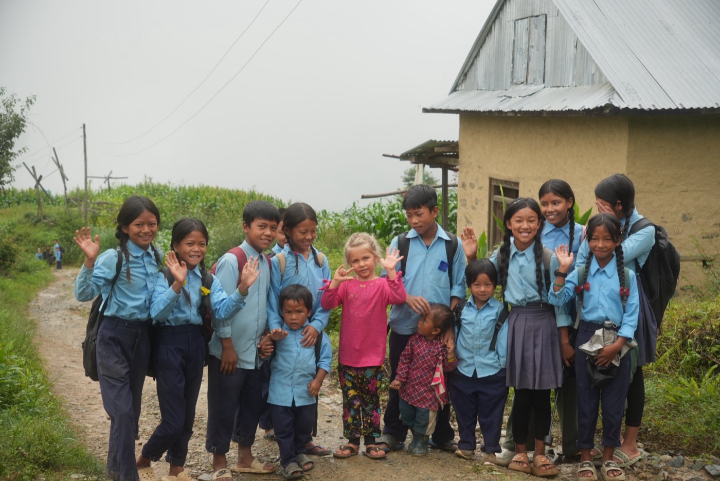 Shanti with schoolchildren in a Nepali mountain village